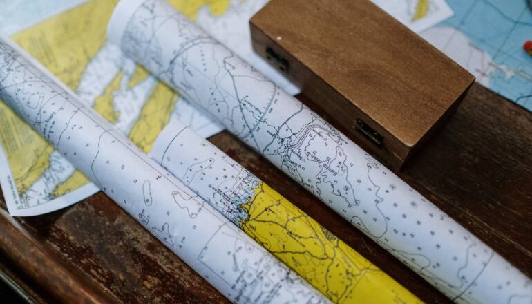 close up photo of rolled maps